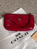 Coach Glossy Embossed Wristlet Patent Leather Red