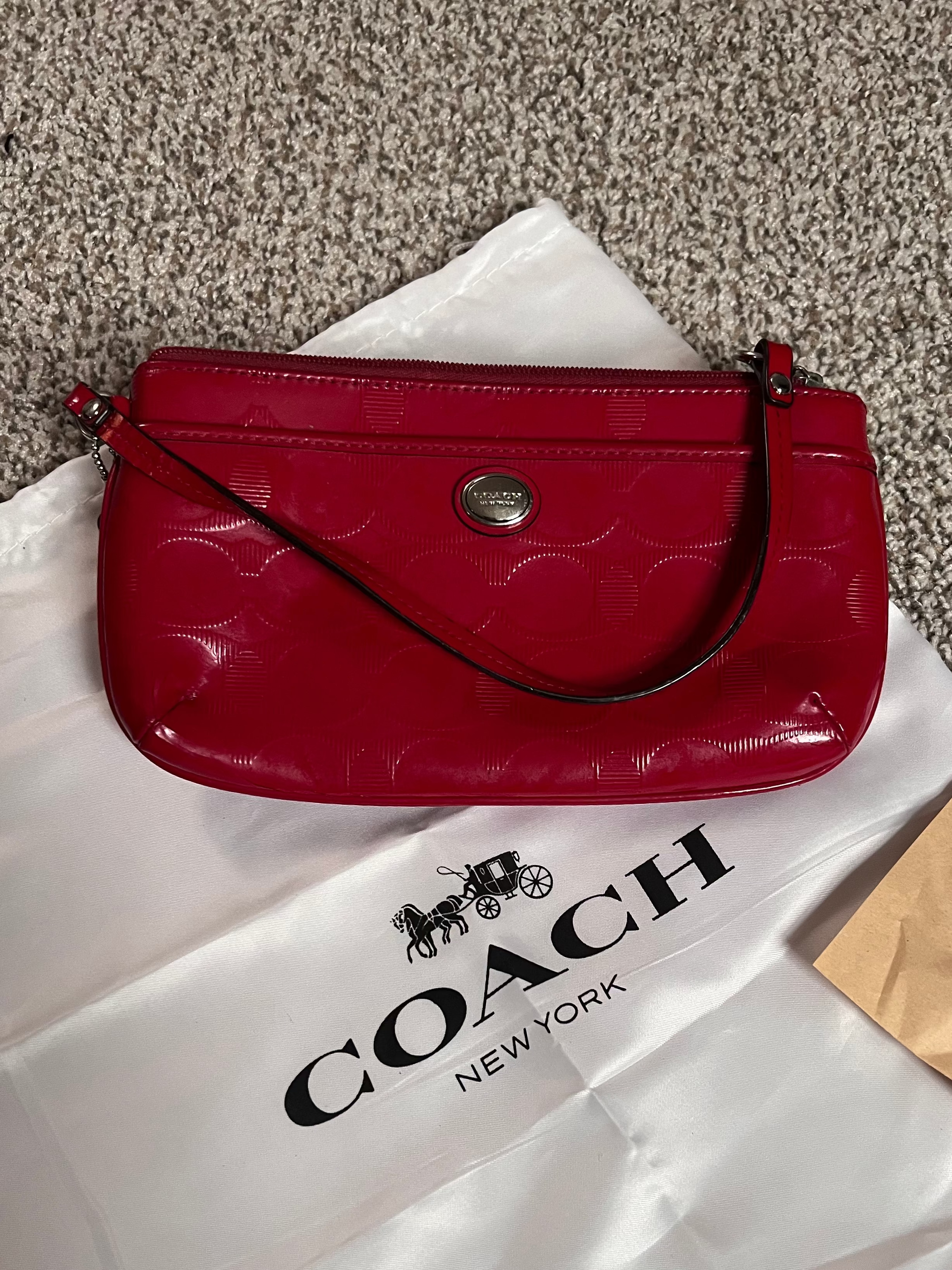 Coach Glossy Embossed Wristlet Patent Leather Red
