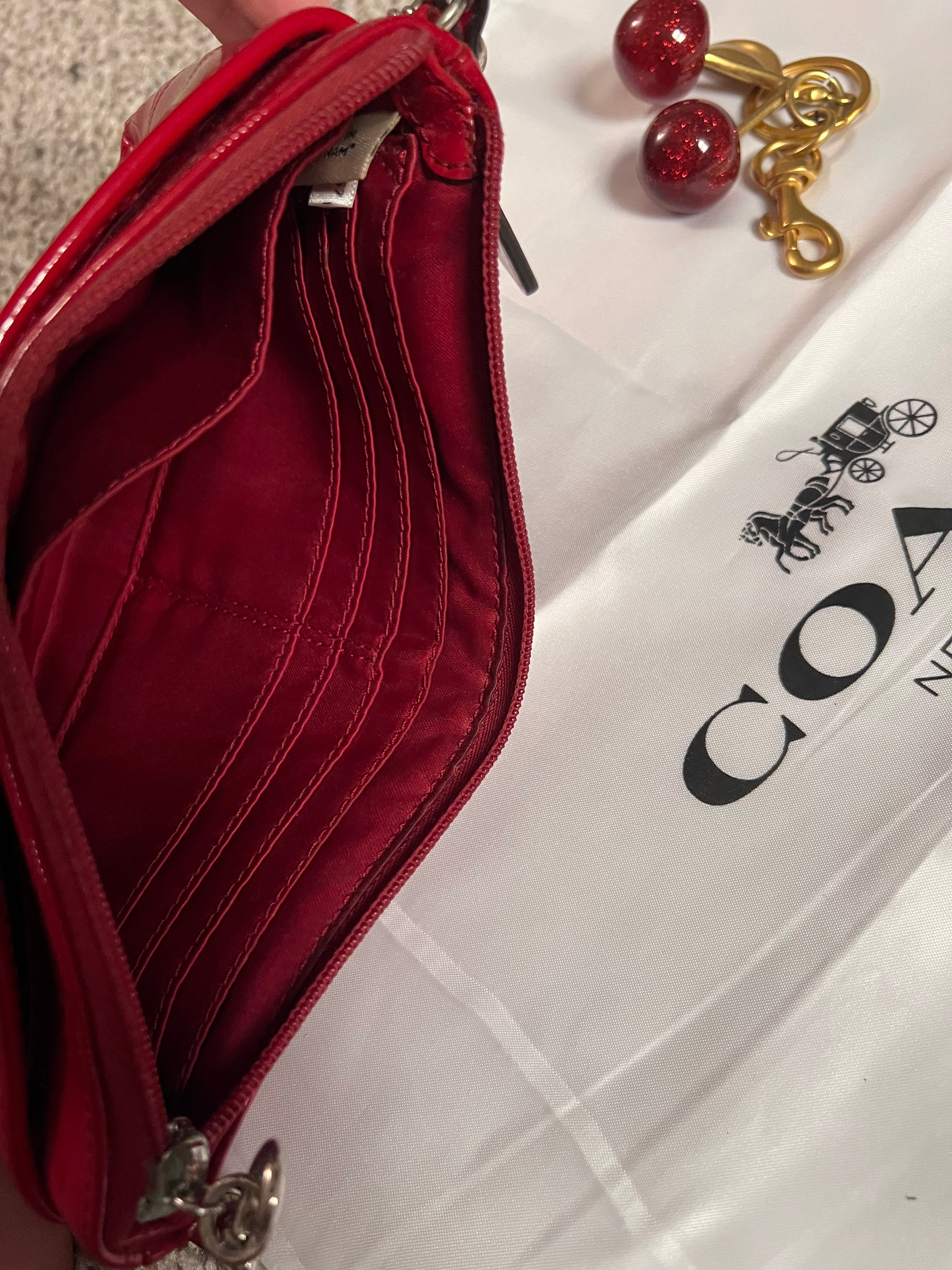 Coach Glossy Embossed Wristlet Patent Leather Red
